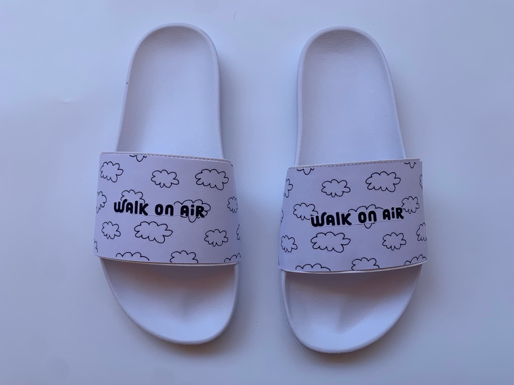 First physical Slidez sample with the cloud artwork test-fit on the strap